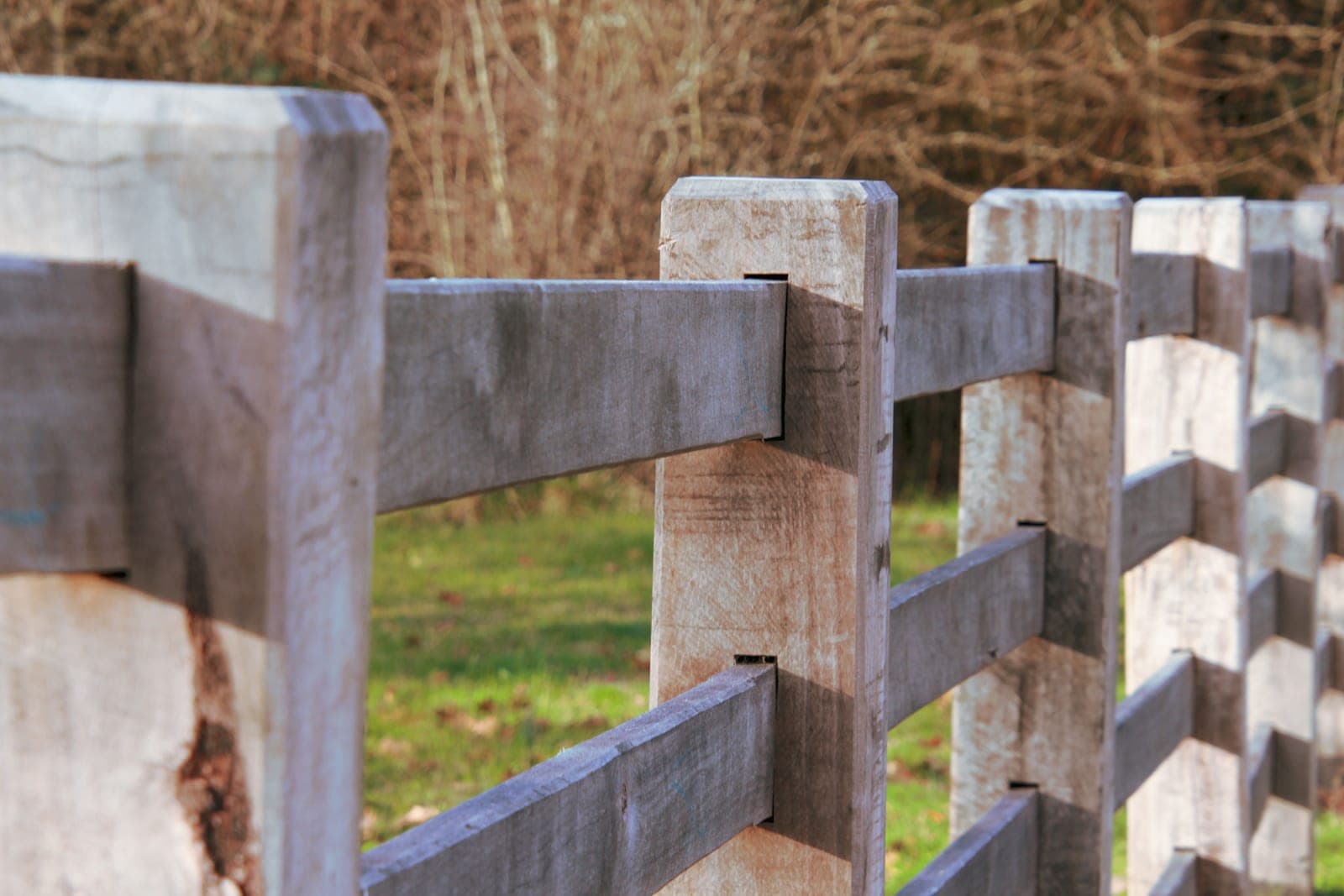 Close-up of a wooden farm fence